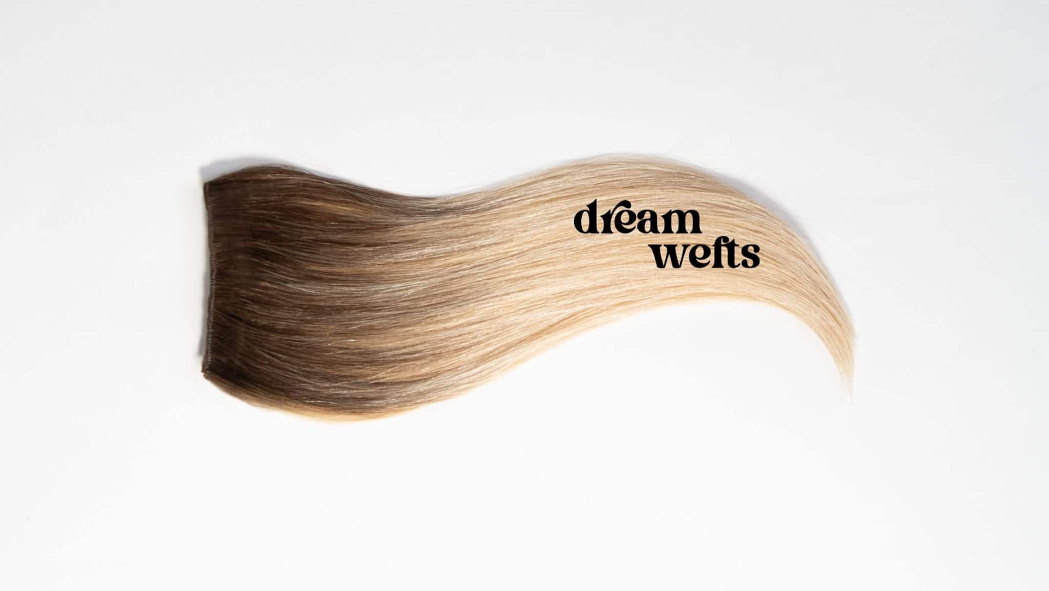 Photo of a Hairdreams real hair weave with balayage gradient and the lettering "dreamwefts"