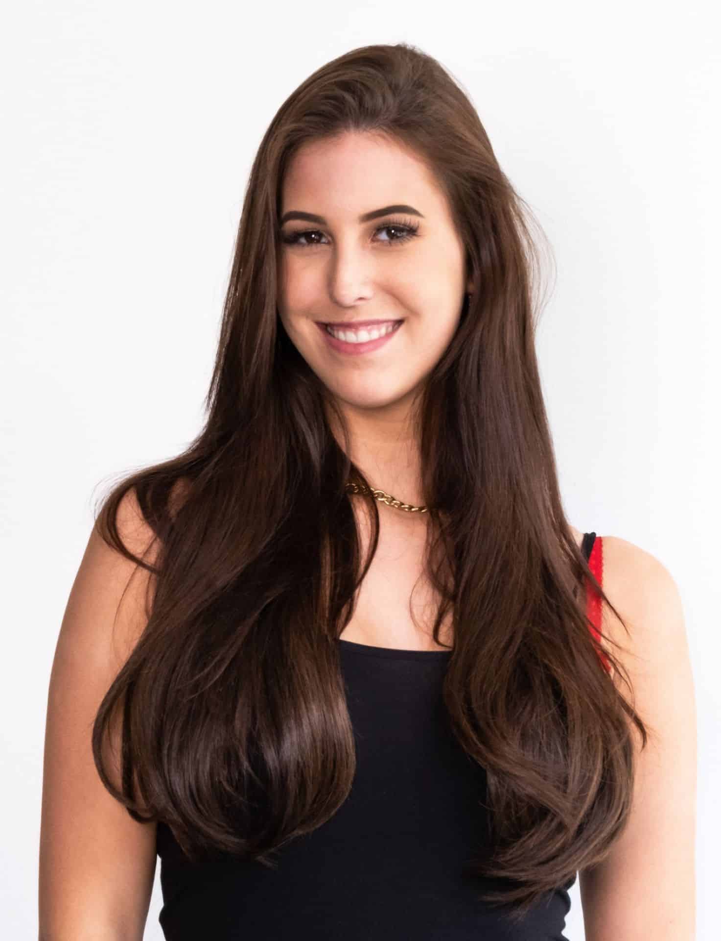 Woman with brown long hair and a Hairdreams hair extension